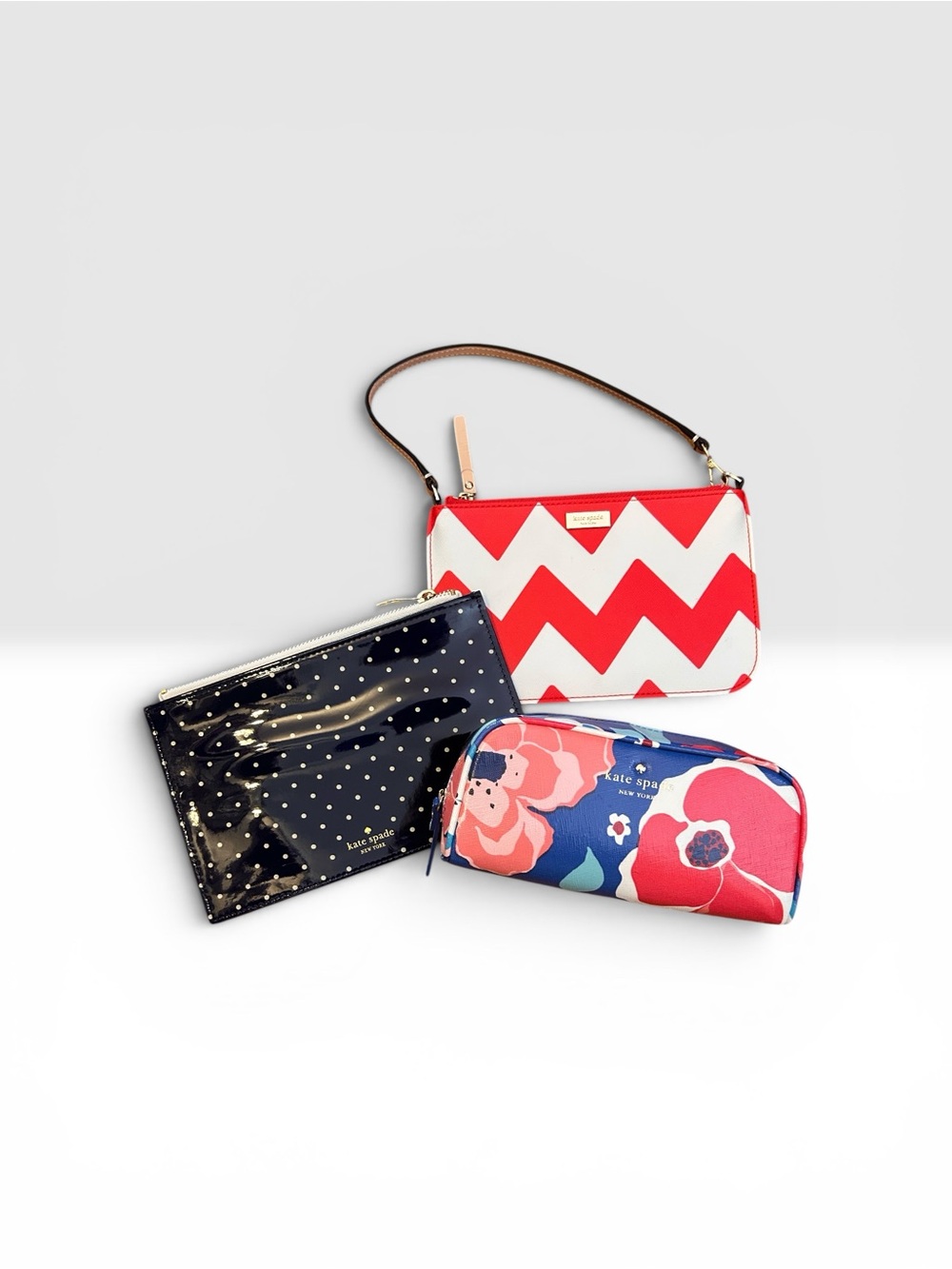 kate spade Red and White Chevron Wristlet with Navy Polka Dot and Floral Pouches
